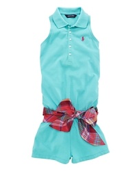 The classic polo shirt inspired a stylish racerback romper, rendered in stretch cotton mesh and finished with a preppy plaid self-belt. The classic polo shirt inspired a stylish racerback romper, rendered in stretch cotton mesh and finished with a preppy plaid self-belt.
