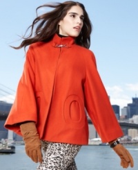Betsey Johnson mixes sixties style with contemporary flair. The swingy fit and bold color make this topper a fashion-forward choice! Betsey Johnson mixes sixties style with contemporary flair. The swingy fit and bold color make this topper a fashion-forward choice!