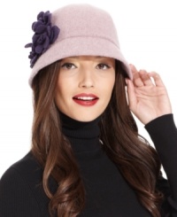 Worthy of an elegant English garden party, this classic cloche from August is poised and pretty. With a petite brim and exquisite floral accent, it lends ladylike appeal to any outfit. Worthy of an elegant English garden party, this classic cloche from August is poised and pretty. With a petite brim and exquisite floral accent, it lends ladylike appeal to any outfit.
