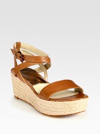 Adjustable leather criss-cross straps rest upon an espadrille wedge and platform. Wear them with a floaty sundress or tailored pants and a fitted tee. Braided hemp wedge, 2 (50mm)Braided hemp platform, 1 (25mm)Compares to a 1 heel (25mm)Leather upperLeather lining and solePadded insoleImported Adjustable leather criss-cross straps rest upon an espadrille wedge and platform. Wear them with a floaty sundress or tailored pants and a fitted tee. Braided hemp wedge, 2 (50mm)Braided hemp platform, 1 (25mm)Compares to a 1 heel (25mm)Leather upperLeather lining and solePadded insoleImported