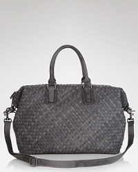 A kinder take on luxury, this Cornelia Guest satchel flaunts a carry everything shape, updated in an on-trend reptilian motif. A kinder take on luxury, this Cornelia Guest satchel flaunts a carry everything shape, updated in an on-trend reptilian motif.
