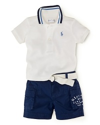 A ruggedly handsome set pairs a preppy cotton polo with a surplus-inspired cargo short for a versatile, laid-back look. A ruggedly handsome set pairs a preppy cotton polo with a surplus-inspired cargo short for a versatile, laid-back look.