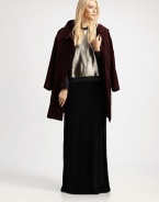 Sculptural and chic, rendered in felted wool and accented with leather buttonhole trim.Attached hoodButton front with leather trimFlap pocketsAbout 36 from shoulder to hemWoolDry cleanImportedModel shown is 5'10 (177cm) wearing US size 4. 