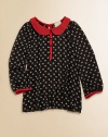 A little birdie told her about this adorable, lightweight, owl-printed blouse with contrasting trim and Peter Pan collar.Peter Pan collarLong sleeves with contrasting cuffsButton-front and backPolyesterDry cleanMade in the USA of imported fabric