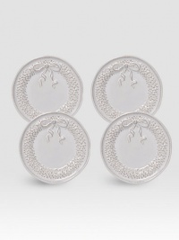A gift-boxed set of delightful ceramic plates are handcrafted with intricate wreath detail, ideal for holiday giving or entertaining. Set of 4 Arrives in a gift box Each, 6½ diam. Dishwasher safe Imported 