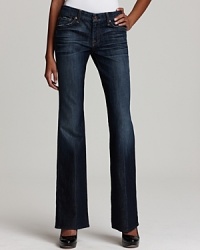 Rendered in a dark, faded wash and classic silhouette, these 7 For All Mankind bootcut jeans are made complete with the brand's signature A stitching on the back pockets. Rendered in a dark, faded wash and classic silhouette, these 7 For All Mankind bootcut jeans are made complete with the brand's signature A stitching on the back pockets.