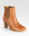 An effortlessly cool leather style with comfortable elastic gores and a towering stacked heel. Stacked heel, 3½ (90mm)Leather upper with side elastic panelsPull-on styleLeather lining and solePadded insoleImportedOUR FIT MODEL RECOMMENDS ordering one half size up as this style runs small. 