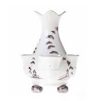 This charming Juliska tulipiere vase depicts romantic elements from English country life in traditional ceramic stoneware. This charming Juliska tulipiere vase depicts romantic elements from English country life in traditional ceramic stoneware.
