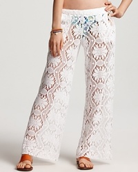 Make hippie chic your sun bathing signature with Trina Turk's crochet pants. Gauzy yet glamorous, this pair lends cabana looks free spirited flair. Make hippie chic your sun bathing signature with Trina Turk's crochet pants. Gauzy yet glamorous, this pair lends cabana looks free spirited flair.