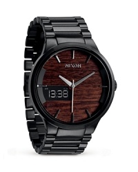 Nixon's coolly sporty timepiece has been given an update with a wood-grain dial and durable stainless steel bracelet. Its standard Japanese quartz movement and custom analog-digital feature makes this round-the-clock style a performance piece. Nixon's coolly sporty timepiece has been given an update with a wood-grain dial and durable stainless steel bracelet. Its standard Japanese quartz movement and custom analog-digital feature makes this round-the-clock style a performance piece.