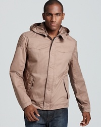 Lightweight and versatile, a khaki windbreaker from BOSS Orange features a detachable zipper hood and a modern slim cut. Lightweight and versatile, a khaki windbreaker from BOSS Orange features a detachable zipper hood and a modern slim cut.