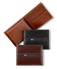 The preppy charm of stripes accent this classic billfold wallet from Tommy Hilfiger. The preppy charm of stripes accent this classic billfold wallet from Tommy Hilfiger.
