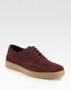 Classic wingtip styling and composition finished in supremely soft suede, shapes and defines this lace-up design with a contrasting rubber sole that exudes a downtown-cool look.Suede upperLeather liningPadded insoleRubber soleImported