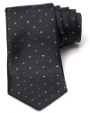 A pindot background is offset by a second pattern of alternating dots for an auspicious addition to your professional wardrobe.