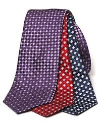 Brilliant toned silk tie covered in an eye-catching box pattern. Brilliant toned silk tie covered in an eye-catching box pattern.