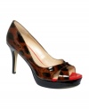 Naturally pretty. Marc Fisher's Girly platform pumps make leopard print look oh-so-feminine.