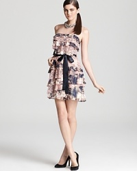 Cinched with a ribbon belt, this Aqua dress flaunts alternating tiers of tie-dye and lace for a bold after-dark look. Cinched with a ribbon belt, this Aqua dress flaunts alternating tiers of tie-dye and lace for a bold after-dark look.