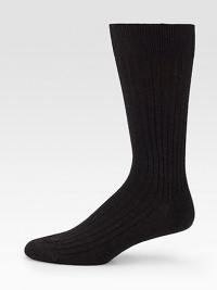 Sophisticated solid ribbed in remarkably soft, virgin merino wool.Mid-calf height80% wool/20% nylonMachine washMade in Italy Sophisticated solid ribbed in remarkably soft, virgin merino wool.Mid-calf height80% wool/20% nylonMachine washMade in Italy