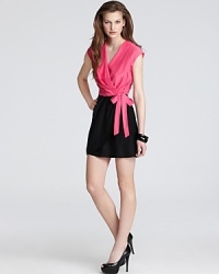 A sophisticated Cynthia Steffe wrap dress works the color block trend for a modern desk-to-dinner piece you'll reach for all season. Elegant pleats add definition to the silhouette, complete with cap sleeves for added femininity. A sophisticated Cynthia Steffe wrap dress works the color block trend for a modern desk-to-dinner piece you'll reach for all season. Elegant pleats add definition to the silhouette, complete with cap sleeves for added femininity.