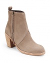 THE LOOKWestern-inspired nubuck upperSide zipper with fringe pullBack tabContrast stitching around the outsolePadded insoleStacked heel, 3½ (90mm)THE MATERIALNubuck upperFabric liningLeather soleORIGINImported