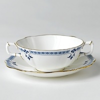 Though Grenville's geometric shapes and studs, set in a narrow border, lend the pattern a modern feel, the stylish leaf and flower elements closely follow classic Derby tradition. Though Grenville's geometric shapes and studs, set in a narrow border, lend the pattern a modern feel, the stylish leaf and flower elements closely follow classic Derby tradition.