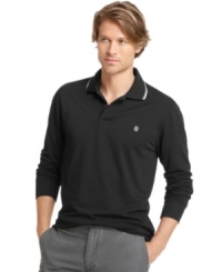 A style that's perfect for both the greens and the clubhouse, look fresh with this moisture-wicking long-sleeve polo from Izod. A style that's perfect for both the greens and the clubhouse, look fresh with this moisture-wicking long-sleeve polo from Izod.