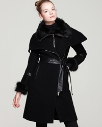 High drama marries pure luxe on this Mackage double-breasted wool coat embellished with plush fur collar and cuffs, a leather belt and arm bands, and shiny zips for downtown edge. High drama marries pure luxe on this Mackage double-breasted wool coat embellished with plush fur collar and cuffs, a leather belt and arm bands, and shiny zips for downtown edge.