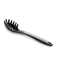 The perfect tool for draining and serving pasta, this Calphalon pasta fork features a hole in the bottom to drain water away quickly, and an extra-long handle to keep your hands away from steaming pasta. The perfect tool for draining and serving pasta, this Calphalon pasta fork features a hole in the bottom to drain water away quickly, and an extra-long handle to keep your hands away from steaming pasta.