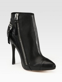 Street-ready zippers amplify this leather ankle boot with a hidden platform and soaring heel. Self-covered heel, 5 (125mm)Hidden platform, ¾ (20mm)Compares to a 4¼ heel (110mm)Leather upperAsymmetrical zip closure and decorative back zipLeather lining and solePadded insoleImportedOUR FIT MODEL RECOMMENDS ordering one half size up as this style runs small. Street-ready zippers amplify this leather ankle boot with a hidden platform and soaring heel. Self-covered heel, 5 (125mm)Hidden platform, ¾ (20mm)Compares to a 4¼ heel (110mm)Leather upperAsymmetrical zip closure and decorative back zipLeather lining and solePadded insoleImportedOUR FIT MODEL RECOMMENDS ordering one half size up as this style runs small.