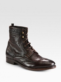 Traditional brogue detailing elevates the casual nature of this lace-up boot, crafted from rich Italian leather, with gold hardware and a sturdy leather sole for endless support.Leather upperLeather liningPadded insoleLeather soleMade in Italy Traditional brogue detailing elevates the casual nature of this lace-up boot, crafted from rich Italian leather, with gold hardware and a sturdy leather sole for endless support.Leather upperLeather liningPadded insoleLeather soleMade in Italy