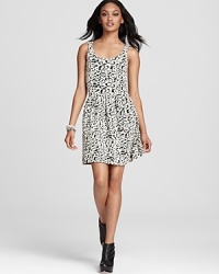 A timeless leopard print takes form in a black and white palette on Aqua's ponte knit, everyday-wear dress. A timeless leopard print takes form in a black and white palette on Aqua's ponte knit, everyday-wear dress.