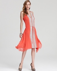 In a neon hue, BCBGMAXAZRIA's lace paneled dress lends a luxe look in silk chiffon. In a neon hue, BCBGMAXAZRIA's lace paneled dress lends a luxe look in silk chiffon.