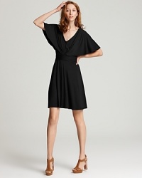 A relaxed silhouette and draped flutter sleeves up the style quotient of this Three Dots V neck dress. A relaxed silhouette and draped flutter sleeves up the style quotient of this Three Dots V neck dress.