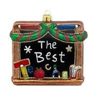 A whimsical holiday ornament of a school chalkboard, inscribed with The Best Teacher. A whimsical holiday ornament of a school chalkboard, inscribed with The Best Teacher.