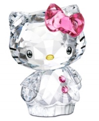 Cuter than ever, Hello Kitty is the picture of innocence in this irresistible Swarovski figurine. With a pink-buttoned top and her trademark bow in sparkling rose crystal.