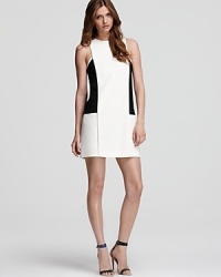 Channel 60s mod in Tibi's color blocked dress, a retro-inspired silhouette with modern appeal. Channel 60s mod in Tibi's color blocked dress, a retro-inspired silhouette with modern appeal.