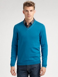 A vibrant approach to dressing as the seasons change, this classic v-neck silhouette is shaped in a soft, smooth blend of cotton, modal and silk, while a tailored, slim-fit is perfect choice for Fall layering.V-neckRibbed knit cuffs and hem60% cotton/30% modal/10% silkDry cleanImported A vibrant approach to dressing as the seasons change, this classic v-neck silhouette is shaped in a soft, smooth blend of cotton, modal and silk, while a tailored, slim-fit is perfect choice for Fall layering.V-neckRibbed knit cuffs and hem60% cotton/30% modal/10% silkDry cleanImported