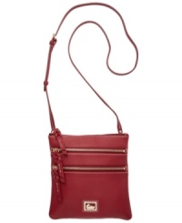 A classic crossbody with a place for everything, this Dooney & Bourke bag will keep you organized for seasons to come. Zipper pockets and a signature emblem grace the front of this gorgeous design. A classic crossbody with a place for everything, this Dooney & Bourke bag will keep you organized for seasons to come. Zipper pockets and a signature emblem grace the front of this gorgeous design.