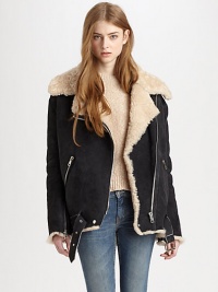 Concluded by a buckled hem and plethora of asymmetrical zippers, this leather topper has plush shearling trim and lining. Notched shearling collarAsymmetrical zipper and snap closuresLong sleeves with zippered cuffsZippered slash pocketsAdjustable buckle at hemAbout 31 from shoulder to hemLambskin leather with shearling trim and liningFur origin: UruguayDry clean with fur specialistImportedModel shown is 5'10 (177cm) wearing US size 4. Concluded by a buckled hem and plethora of asymmetrical zippers, this leather topper has plush shearling trim and lining. Notched shearling collarAsymmetrical zipper and snap closuresLong sleeves with zippered cuffsZippered slash pocketsAdjustable buckle at hemAbout 31 from shoulder to hemLambskin leather with shearling trim and liningFur origin: UruguayDry clean with fur specialistImportedModel shown is 5'10 (177cm) wearing US size 4.