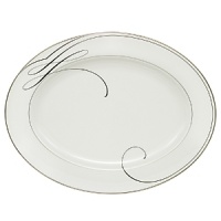 Waterford's Ballet Ribbon bone china dinnerware echoes the graceful forms and lines of the interpretive dance and the satin ribbons which adorn ballerinas' costumes and pointe shoes. Mix in the brightly colored accent plates to make your table pop or to blend the pattern into your dining décor. Waterford's Ballet Ribbon bone china dinnerware echoes the graceful forms and lines of the interpretive dance and the satin ribbons which adorn ballerinas' costumes and pointe shoes. Mix in the brightly colored accent plates to make your table pop or to blend the pattern into your dining décor.