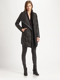 From the HELMUT capsule collection. A cold weather essential with quilted details and an asymmetrical hem. Oversized, stand collarLong sleevesZip frontFront slash pocketsQuilted backAsymmetrical hemAbout 36 from shoulder to hemPolyamideDry cleanImported of Italian fabricModel shown is 5'10 (177cm) wearing US size Small. From the HELMUT capsule collection. A cold weather essential with quilted details and an asymmetrical hem. Oversized, stand collarLong sleevesZip frontFront slash pocketsQuilted backAsymmetrical hemAbout 36 from shoulder to hemPolyamideDry cleanImported of Italian fabricModel shown is 5'10 (177cm) wearing US size Small.