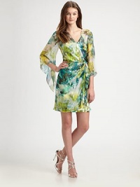 Airy chiffon in a dappled abstract print, tailored in a faux wrap silhouette.Surplice necklineBatwing three-quarter sleevesFaux wrap front with side drapeConcealed back zip with keyhole hook-and-eye closureFully linedAbout 22 from natural waistPolyesterDry cleanMade in Italy of imported fabricModel shown is 5'10 (177cm) wearing US size 4. Airy chiffon in a dappled abstract print, tailored in a faux wrap silhouette.Surplice necklineBatwing three-quarter sleevesFaux wrap front with side drapeConcealed back zip with keyhole hook-and-eye closureFully linedAbout 22 from natural waistPolyesterDry cleanMade in Italy of imported fabricModel shown is 5'10 (177cm) wearing US size 4.