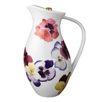 Pensees hot beverage server by Bernardaud. This lively, luxurious collection is sure to transform your table into a celebration of spring. The floral watercolor pattern features delicate, multicolored pansies that appear to be strewn across the surface of each piece. Pensees hot beverage server by Bernardaud. This lively, luxurious collection is sure to transform your table into a celebration of spring. The floral watercolor pattern features delicate, multicolored pansies that appear to be strewn across the surface of each piece.