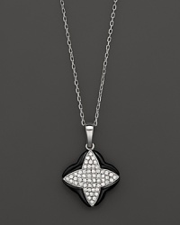 White diamonds and black onyx set in 14K. white gold White diamonds and black onyx set in 14K. white gold