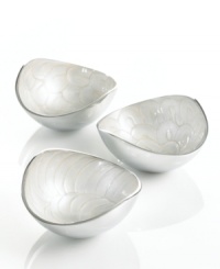 Full of surprises, these handcrafted nut bowls from the Simply Designz collection of serveware and serving dishes feature sleek, polished aluminum lined with scalloped ivory enamel. An elegant set for serving snacks or simply decorating the table. Full of surprises, these handcrafted nut bowls from the Simply Designz collection of serveware and serving dishes feature sleek, polished aluminum lined with scalloped ivory enamel. An elegant set for serving snacks or simply decorating the table.