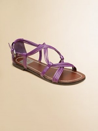 She'll love to rock these stylish strappy sandals with criss cross detail.Slip-on with buckle closurePolyurethane upperSynthetic liningSynthetic soleImportedAdditional InformationKid's Shoe Size Guide (European Equivalent) She'll love to rock these stylish strappy sandals with criss cross detail.Slip-on with buckle closurePolyurethane upperSynthetic liningSynthetic soleImportedAdditional InformationKid's Shoe Size Guide (European Equivalent)