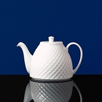 Simple shapes of crisp white are accented with precisely etched lines. Contrasting black matte jasper accessories with glazed interiors are also available. Bone china. Simple shapes of crisp white are accented with precisely etched lines. Contrasting black matte jasper accessories with glazed interiors are also available. Bone china.