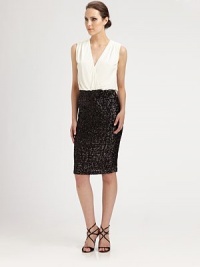 Simply sophisticated in fluid jersey with soft draping top and beaded skirt.Deep V necklineShirred shouldersElasticized waistBeaded skirtConcealed back zipperLinedAbout 41 from shoulder to hemViscoseSpot cleanImportedModel shown is 5'10 (177cm) wearing US size 4. Simply sophisticated in fluid jersey with soft draping top and beaded skirt.Deep V necklineShirred shouldersElasticized waistBeaded skirtConcealed back zipperLinedAbout 41 from shoulder to hemViscoseSpot cleanImportedModel shown is 5'10 (177cm) wearing US size 4.