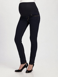 The sleek, skinny-leg silhouette of dark denim with an expandable, elastic belly panel is the ultimate choice in maternity style. THE FITSlim-leg Rise, about 11 Inseam, about 34½THE DETAILSFaux fly Five-pocket style Contrast topstitching Dark washCotton/polyester/lycra; machine wash Made in USA 