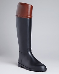 A master of equestrian and rainy day style, Burberry lends these rain boots iconic good looks that will have you reaching for them rain or shine. A master of equestrian and rainy day style, Burberry lends these rain boots iconic good looks that will have you reaching for them rain or shine.